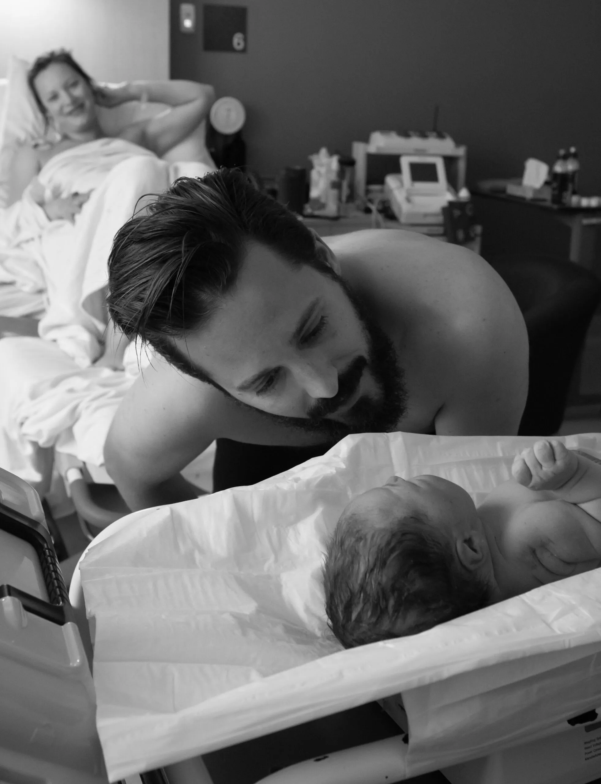 Father meeting his newborn